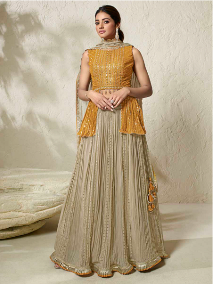 Buy Cream and Yellow Peplum Lehenga Set Online from Mangalam Designer